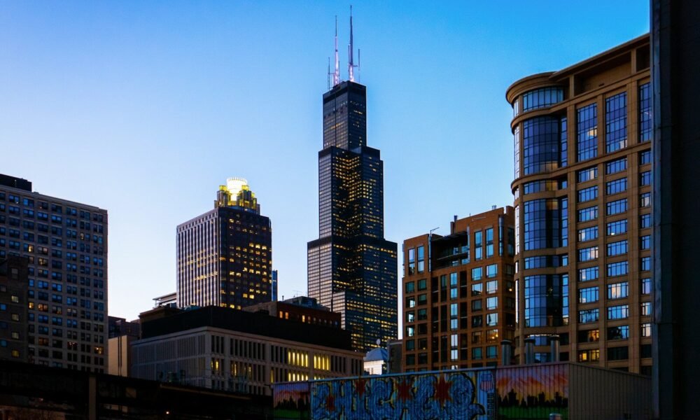 brown and black high rise buildings under blue sky during daytime
